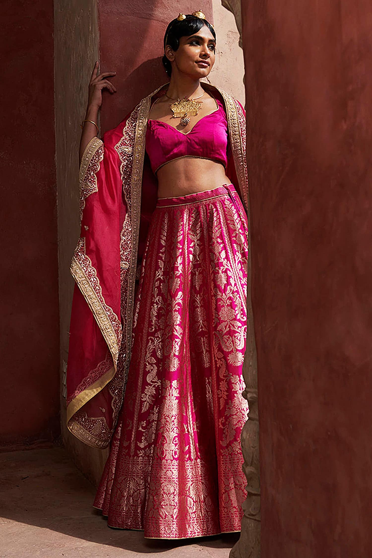 GRACEFUL PLEATED BANARASI LEHENGA CHOLI IN PINK ORGANZA - HALFSAREE STUDIO  - 4213968