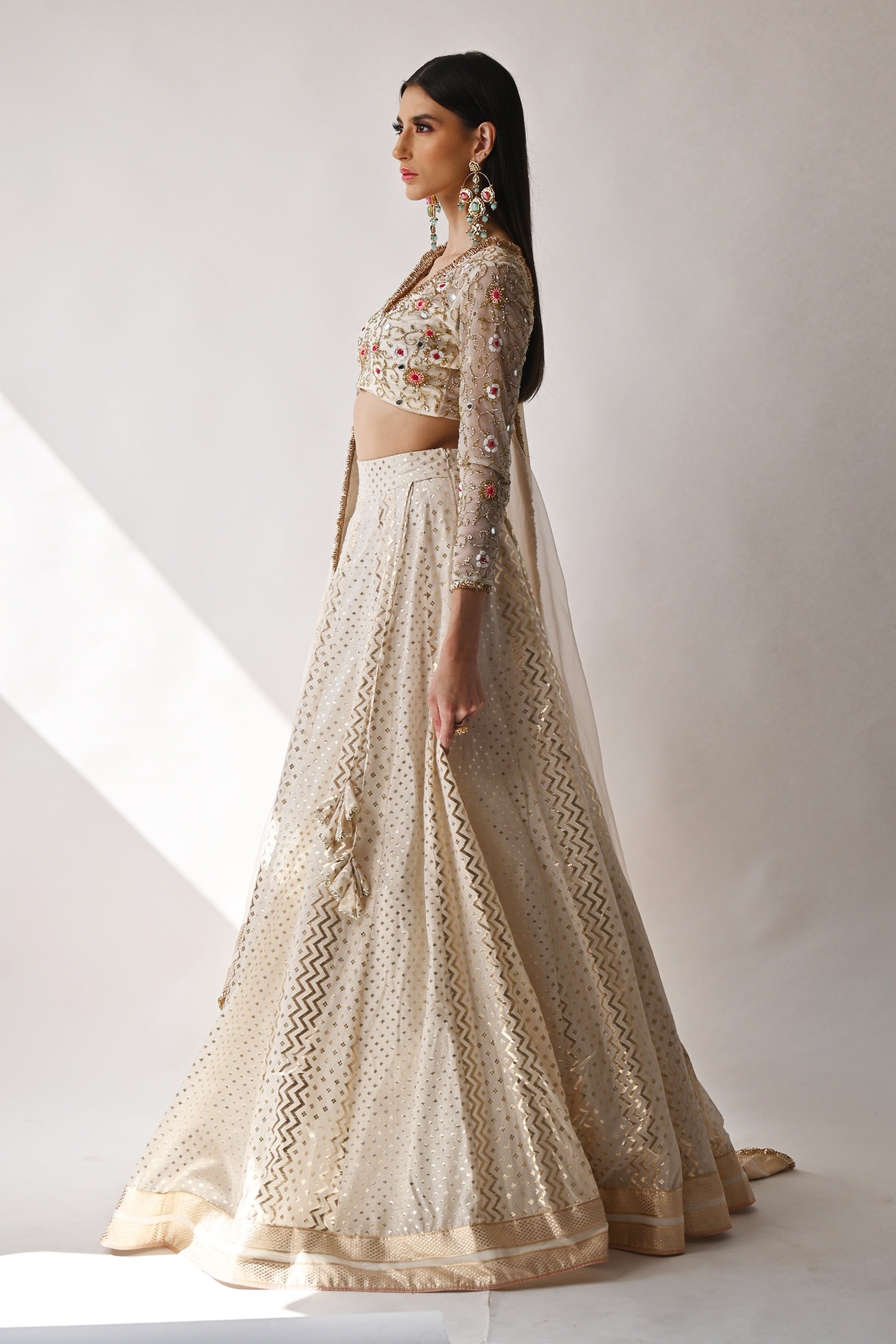 Ivory Floor Length Gown Design by Neha & Tarun at Modvey