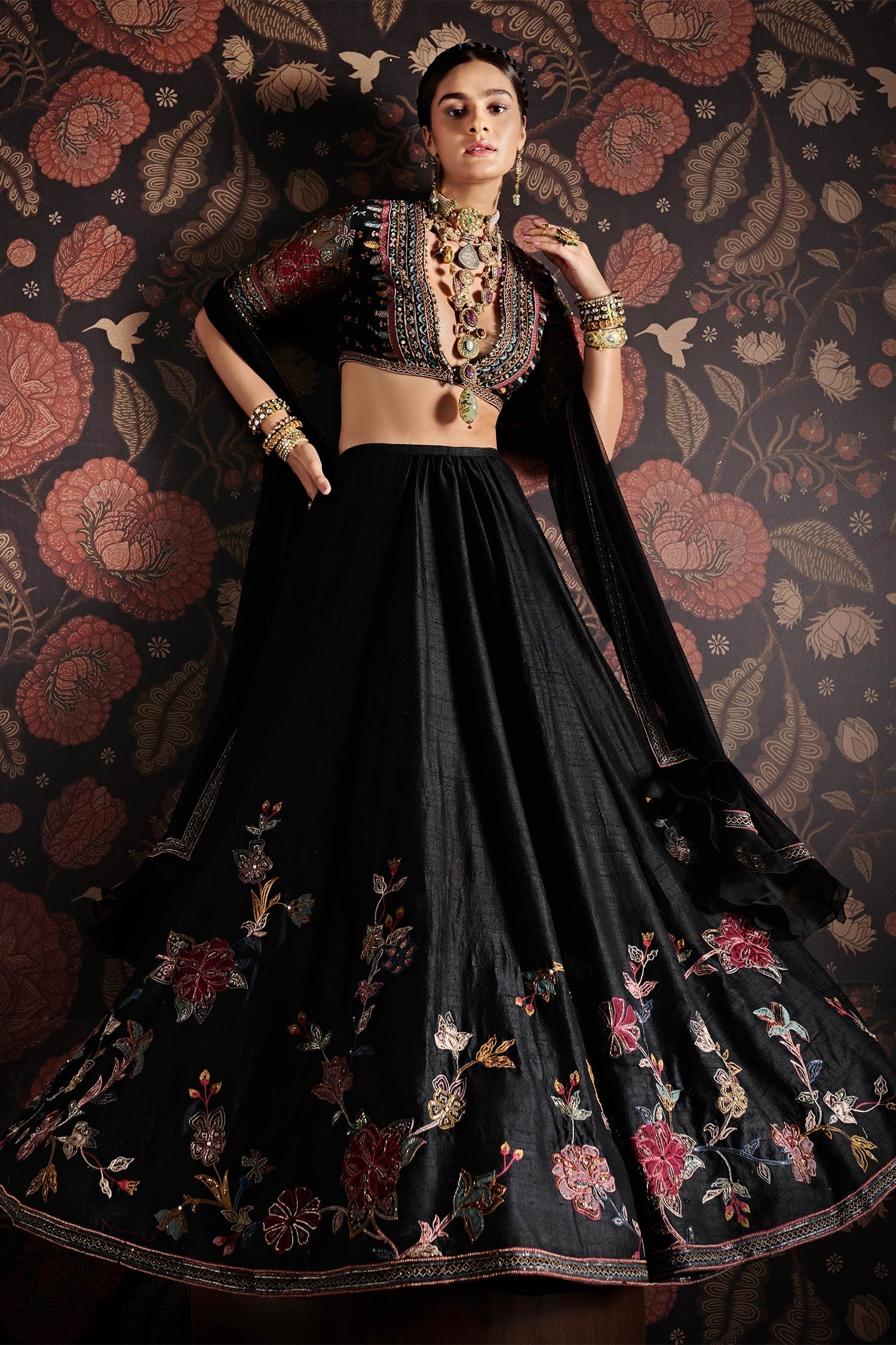 BLACK AND WHITE HARLEQUIN PRINTED LEHENGA SET WITH A HAND EMBROIDERED BLACK  BLOUSE PAIRED WITH A MATCHING DUPATTA AND SELF COLOURED DETAILS. - Seasons  India