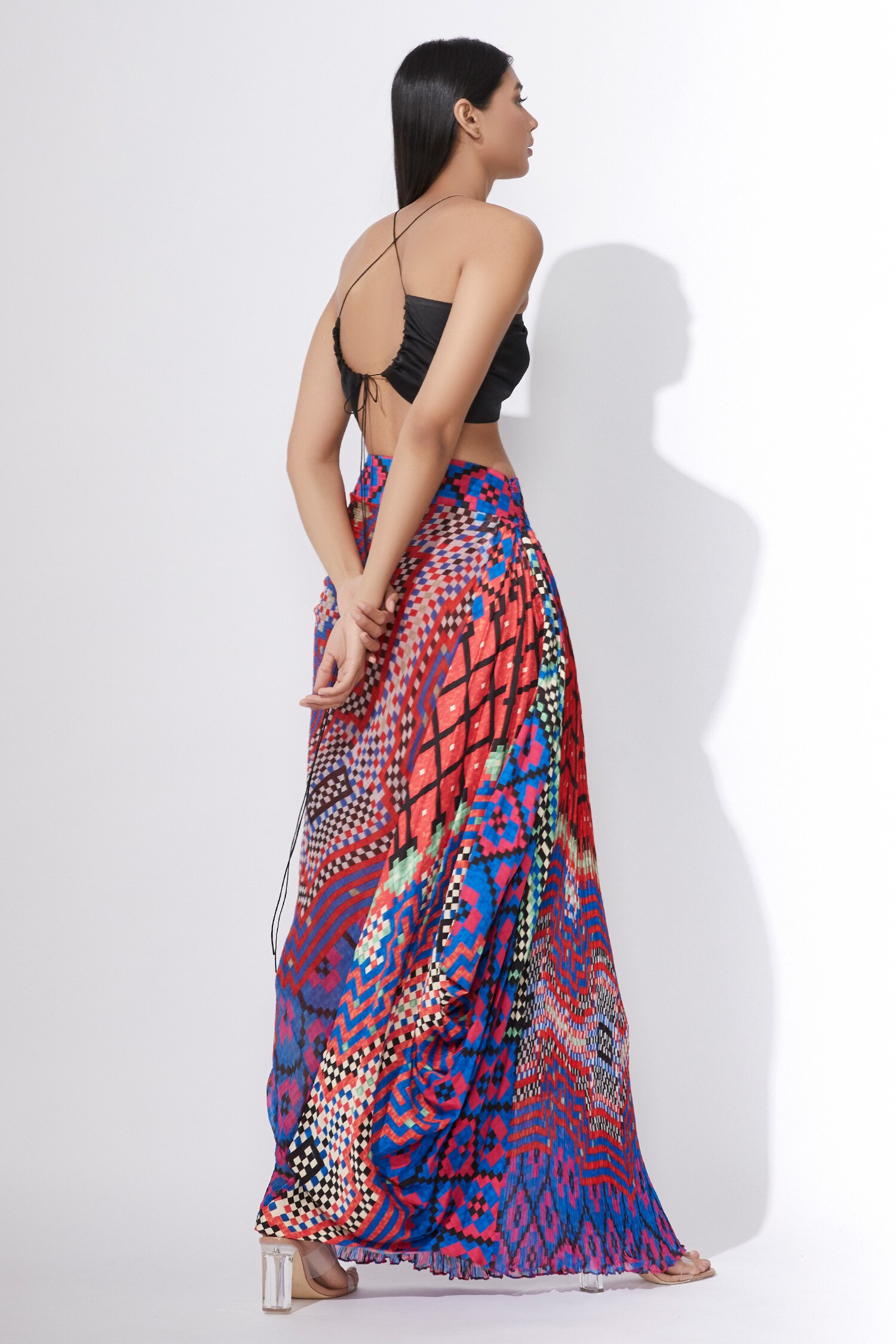 Buy Multi Swiggle Print Halter Neck Bralette with Asymmetric Style Wrap  Skirt by SAAKSHA & KINNI at Ogaan Online Shopping Site