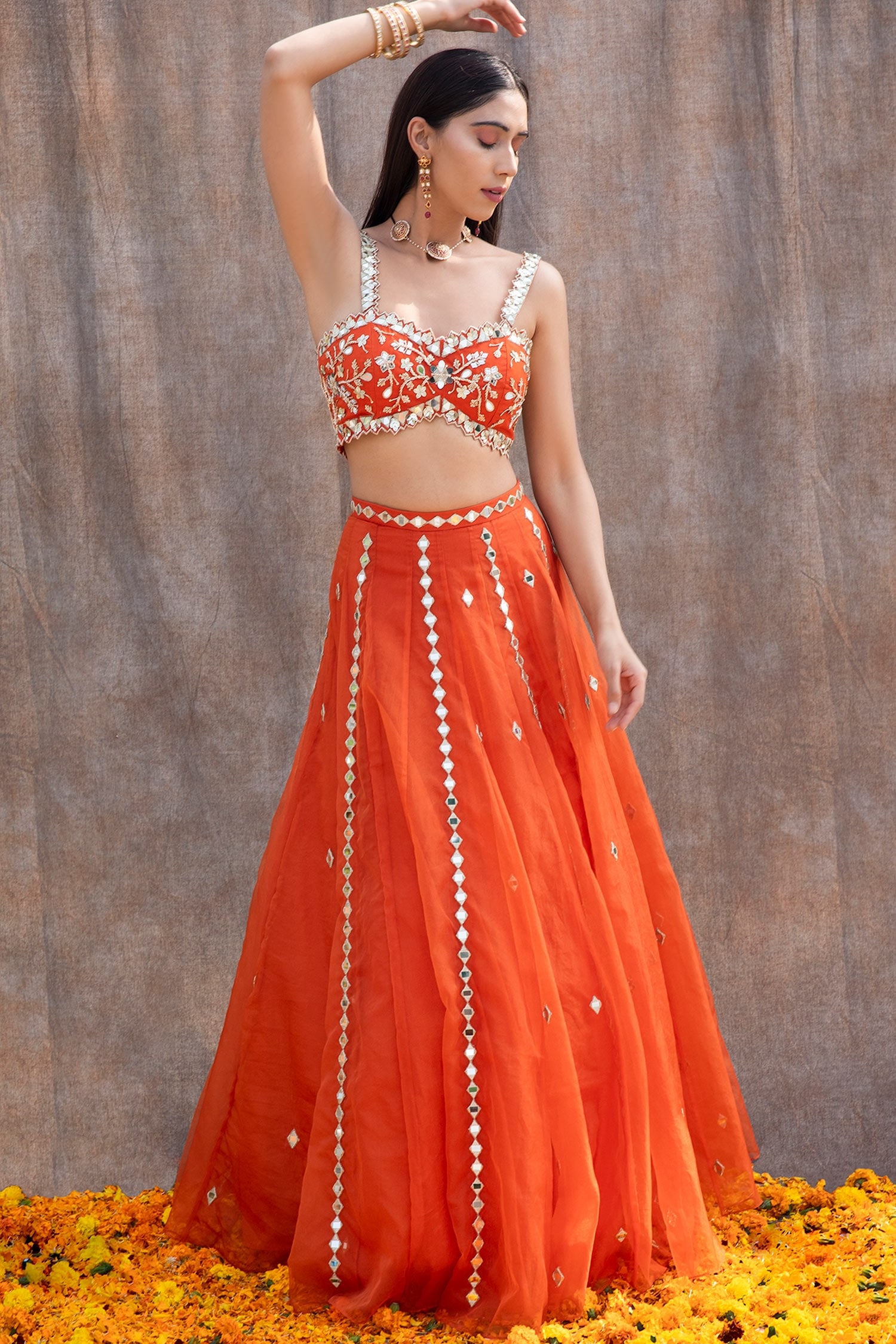 What color of the blouse is suitable for orange lehenga? - Quora