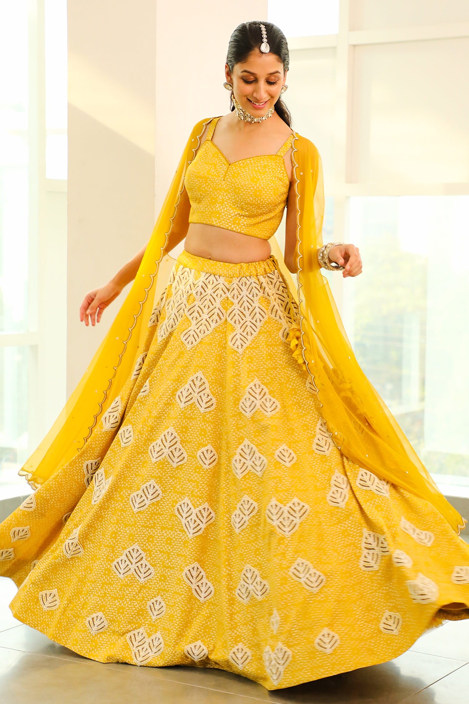 Buy Vidushi Gupta Yellow Chiffon Printed Lehenga And Cape Dupatta Set 